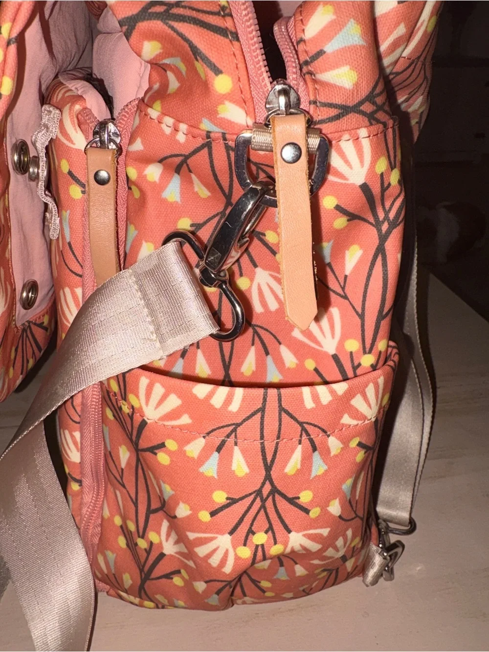 Petunia Pickle Bottom Coral Floral Baby Bag with Champagne Strap